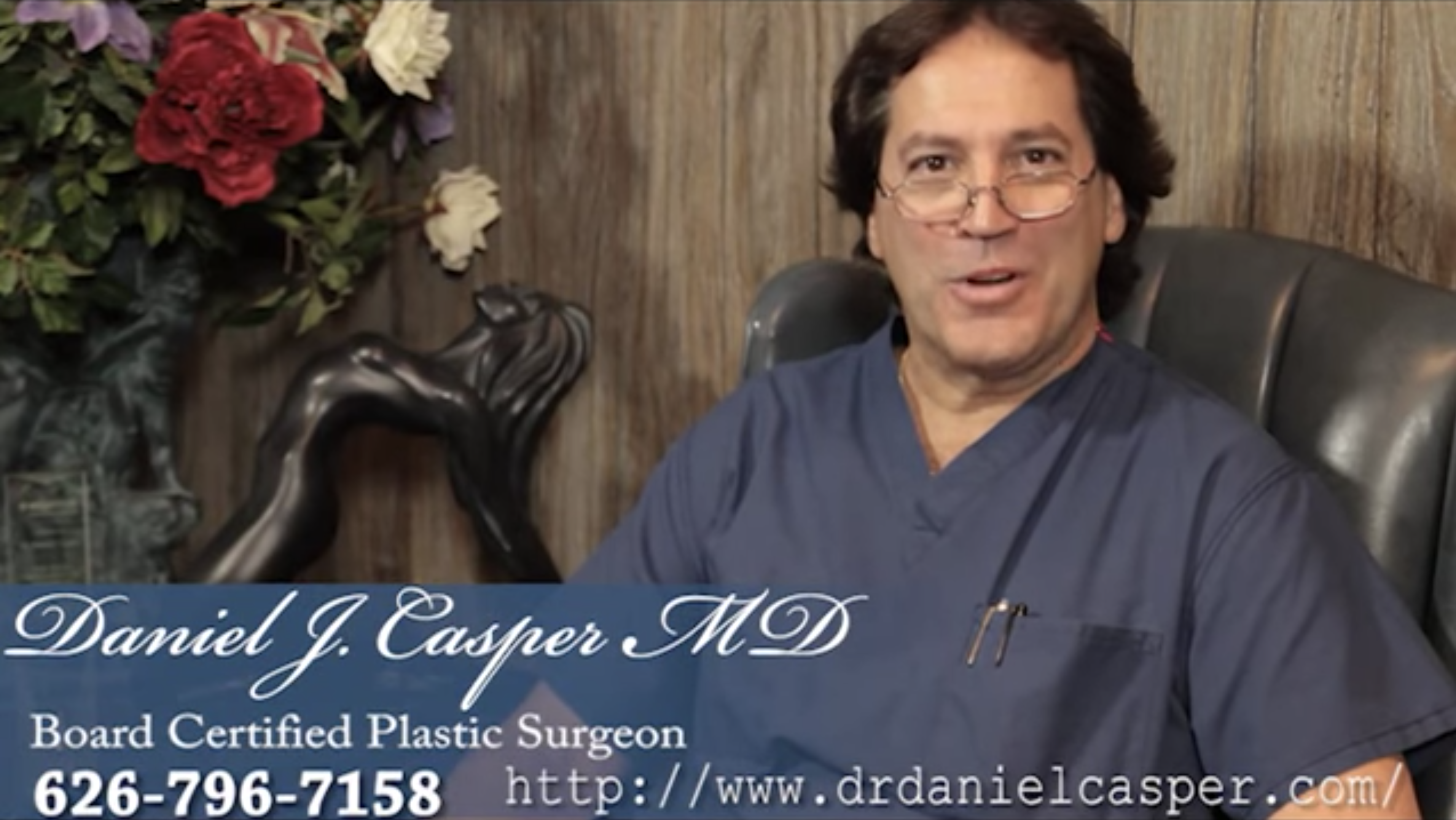 video thumbnail of Dr Casper sitting on a leather chair